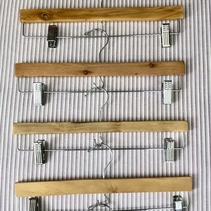 Wood skirt/pant hangers - set of 6; hangers have hooks to link together